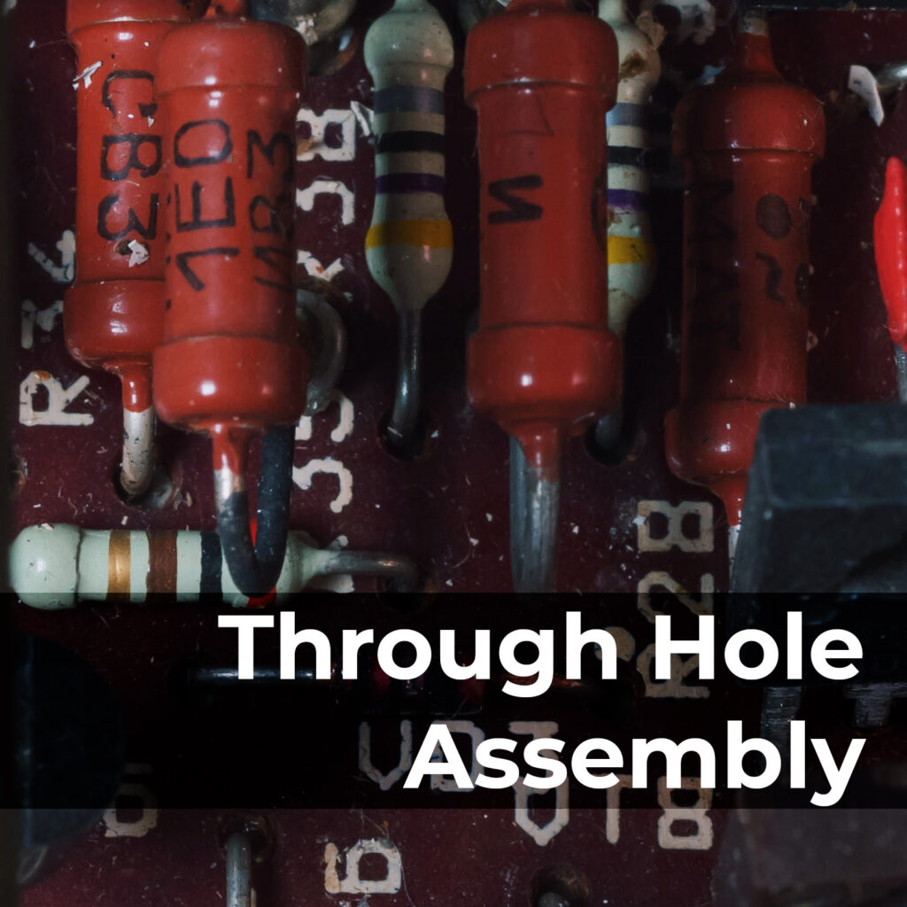 Through-hole assembly in electronics is the process of mounting electronic components onto a printed circuit board (PCB) by inserting their leads through holes in the board and soldering them on the opposite side for secure connections.